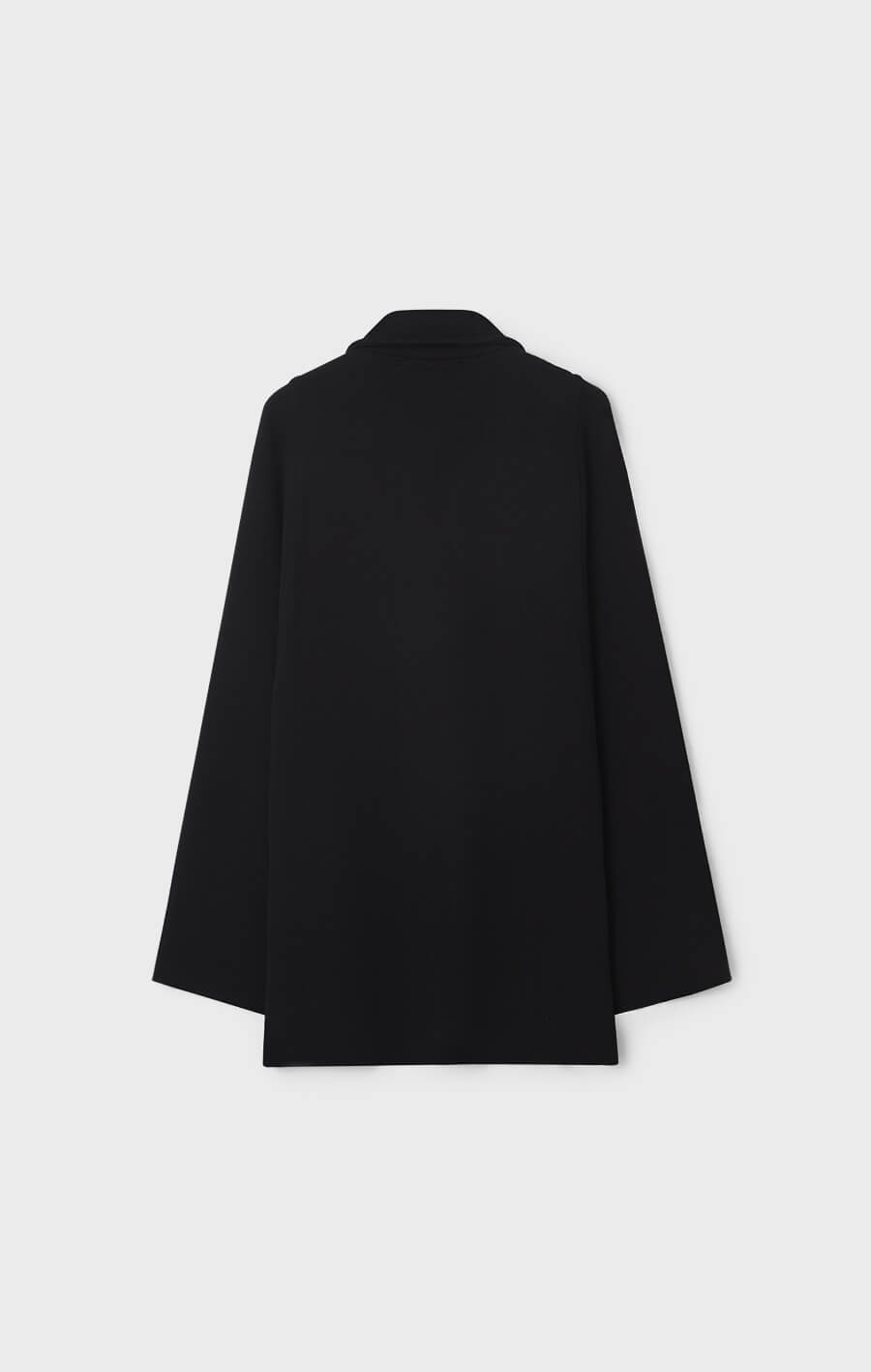 Minou stickad cape i ull svart